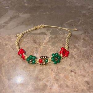 Macrame Christmas Bracelet With Red, Green and 14 Pleated Gold Beads Adjustable